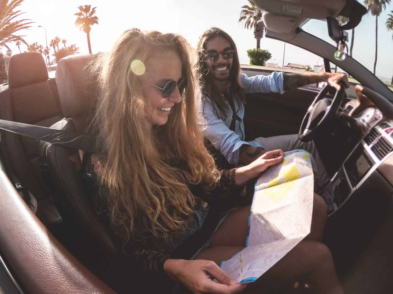 Image of two people taking a Cabarete road trip.